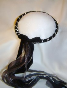 Black velvet and silver circlet.