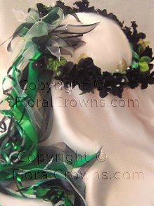 Carleigh wreath- 

black flowers with kelly green, black andsilver ribbons