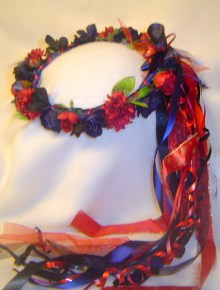 Jayla wreath, nvy and red roses and blossoms.