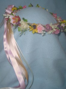 Dainty meadow flowers and ribbons in soft summer colors.