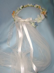 Beautiful Felicity wreath in soft colors and ivory 
veil.